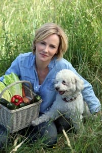 Woman with dog and basket of vegetables