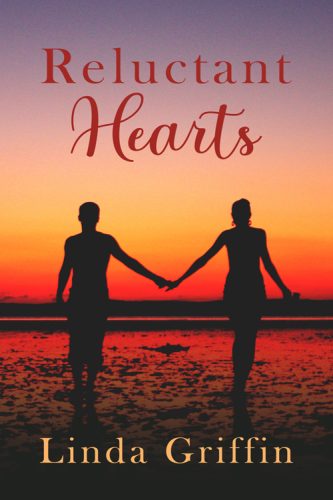 Cover image for Reluctant Hearts by Linda Griffin. A man and woman walking on the beach at sunset.